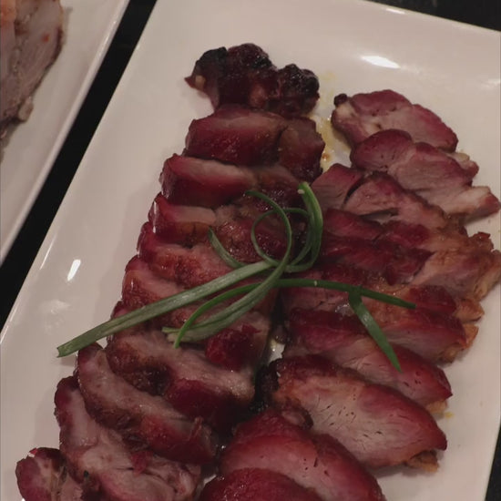 
Plated roast meats and Kau Kong knives