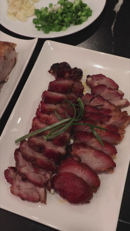 
Plated roast meats and Kau Kong knives