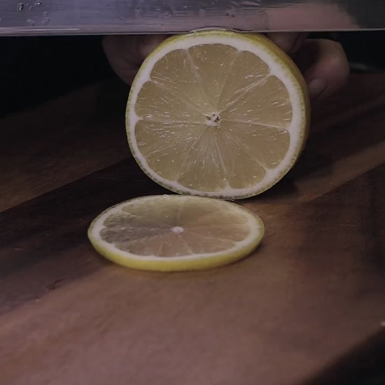 
Four consecutive thin lemon slices with the Leung Tim Peking duck slicer, silent demonstration
